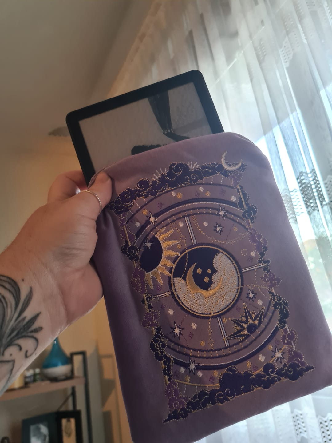 Customer photo review of Otherworldly Lilac Kindle & E-Reader Sleeve