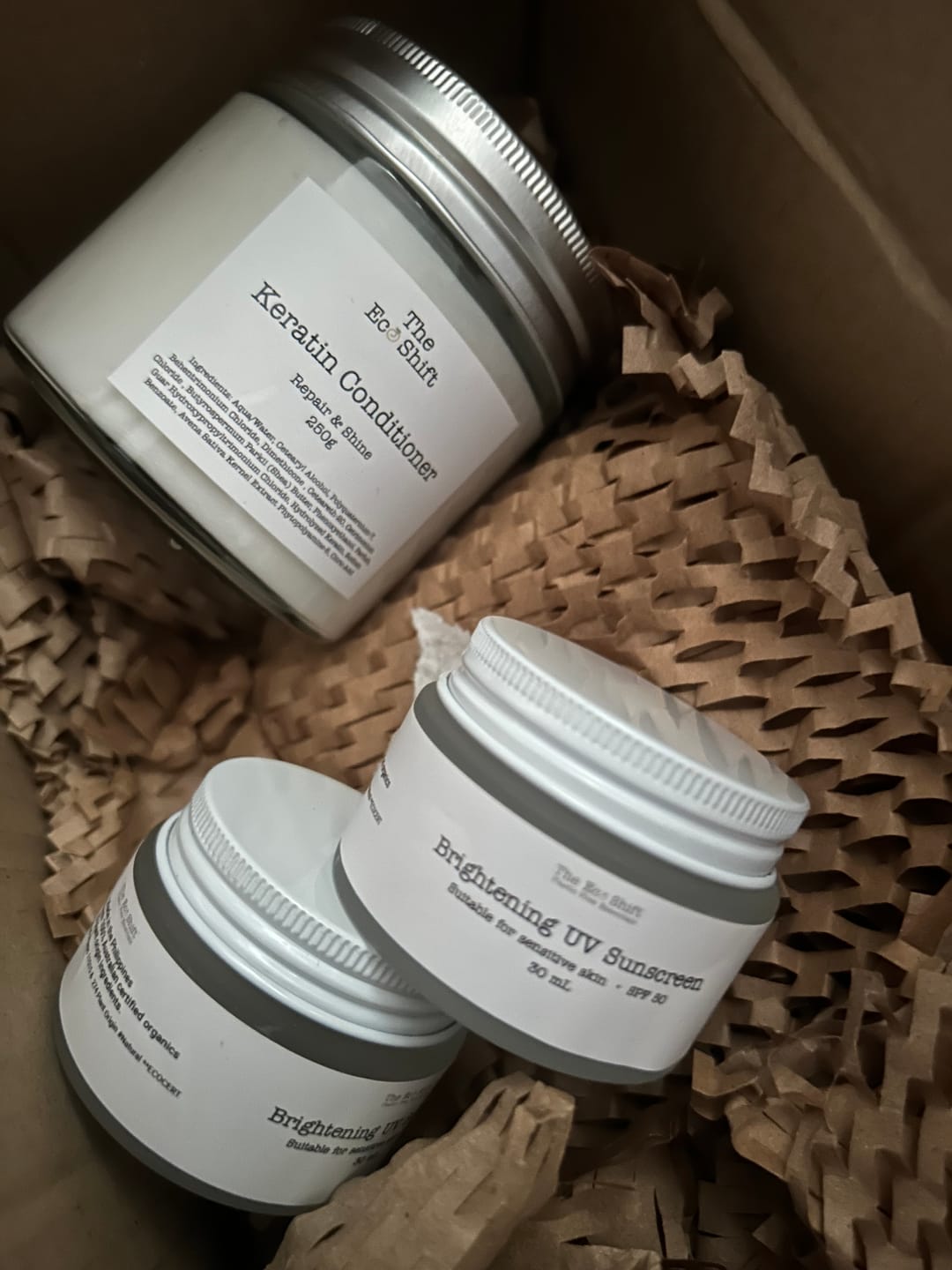 Customer photo review of Brightening UV Sunscreen & Skin Primer with SPF 50