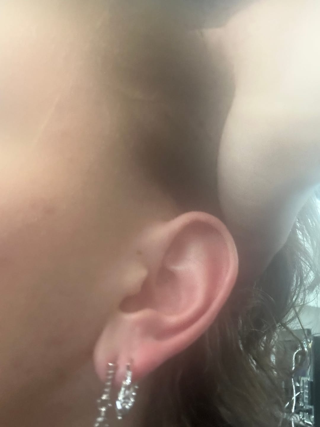 Customer photo review of ARMORED OPEN HOOP EARRING