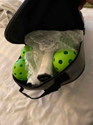 Customer photo review of Premier Paddle Set - 2 Paddles, 4 Balls, 2 Grips, & Bag