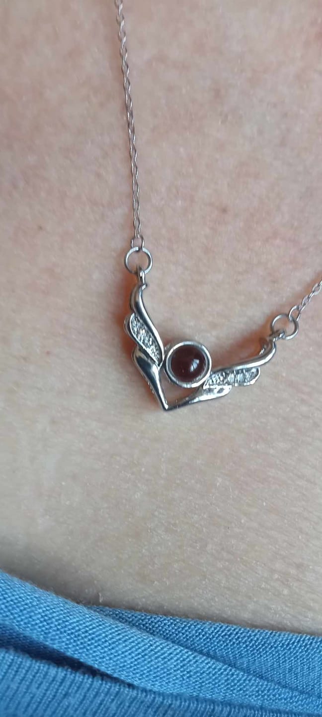 Customer photo review of Pure Angel Wings Projection Necklace