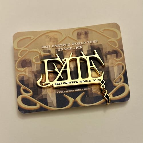 Customer photo review of Enhypen 2023 World Tour Enamel Pins