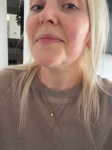 Customer photo review of Tiny bubble initial necklace