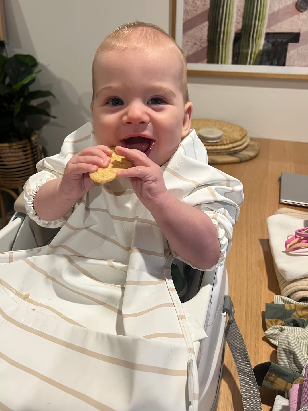 Customer photo review of Mess-Free Smock Bib | Beige Stripe