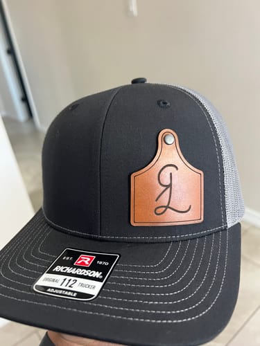 Customer photo review of Custom Leather Patch Trucker Hat - Richardson 112