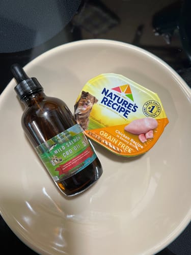 Customer photo review of Large Wild Salmon CBD Oil - 1,400 MG : 4 OZ : Healthy Hips & Joints Care Formula CBD for dogs and cats