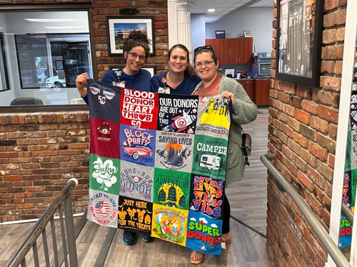 T-shirt quilt with blood donation, outdoor activities themes by Sarah from TN