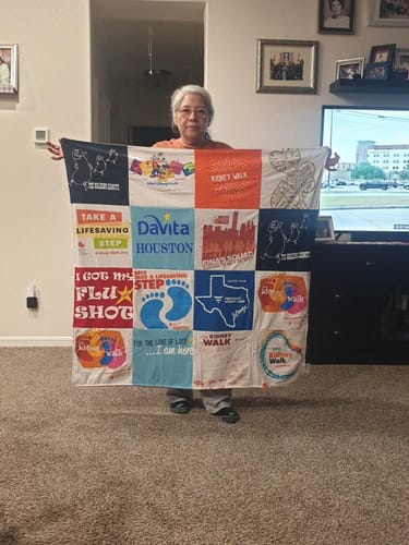 T-shirt quilt with health awareness, community service themes by Rosa from TX