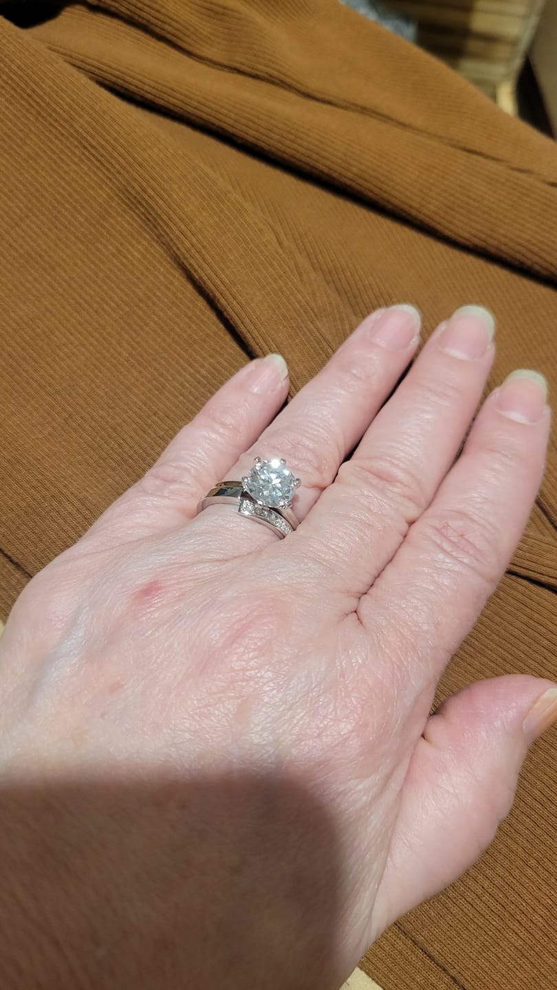 Customer photo review of Classic Solitaire Moissanite Six-Prong Sterling Silver Engagement Ring
