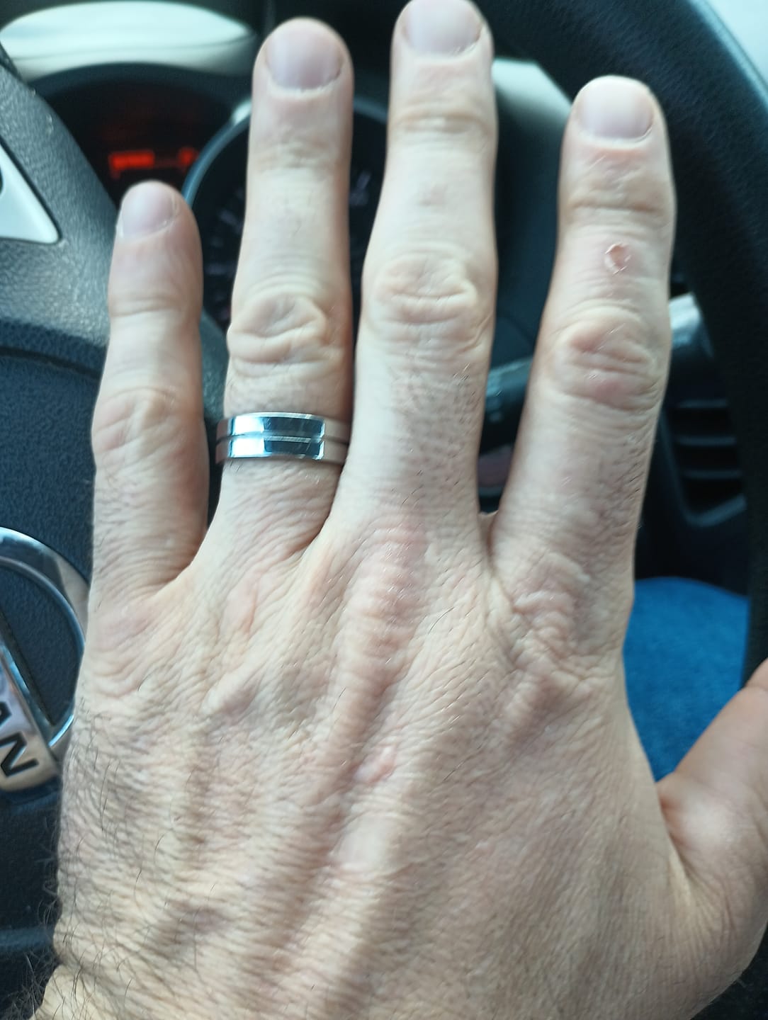 Customer photo review of His and Hers Matching Titanium Ring Set