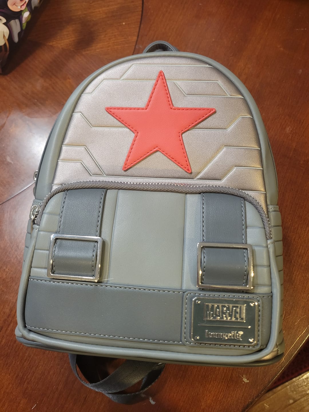 Customer photo review of Loungefly Marvel Winter Soldier Cosplay Mini Backpack