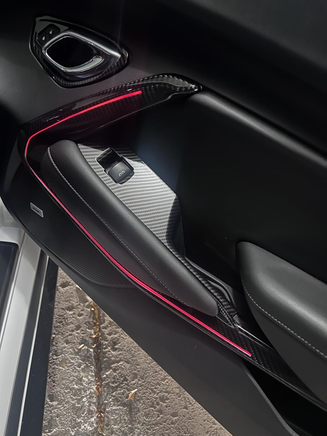 Customer photo review of 2016-2024 Camaro Real Carbon Fiber Interior Door Panel Chrome Trim Cover