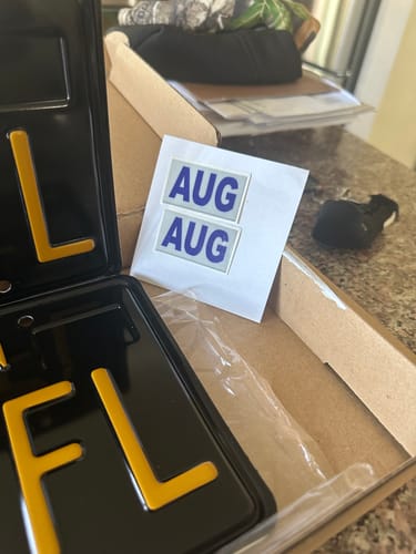 Customer photo review of MONTH AUGUST / AUG STICKER ON CALIFORNIA LICENSE PLATE
