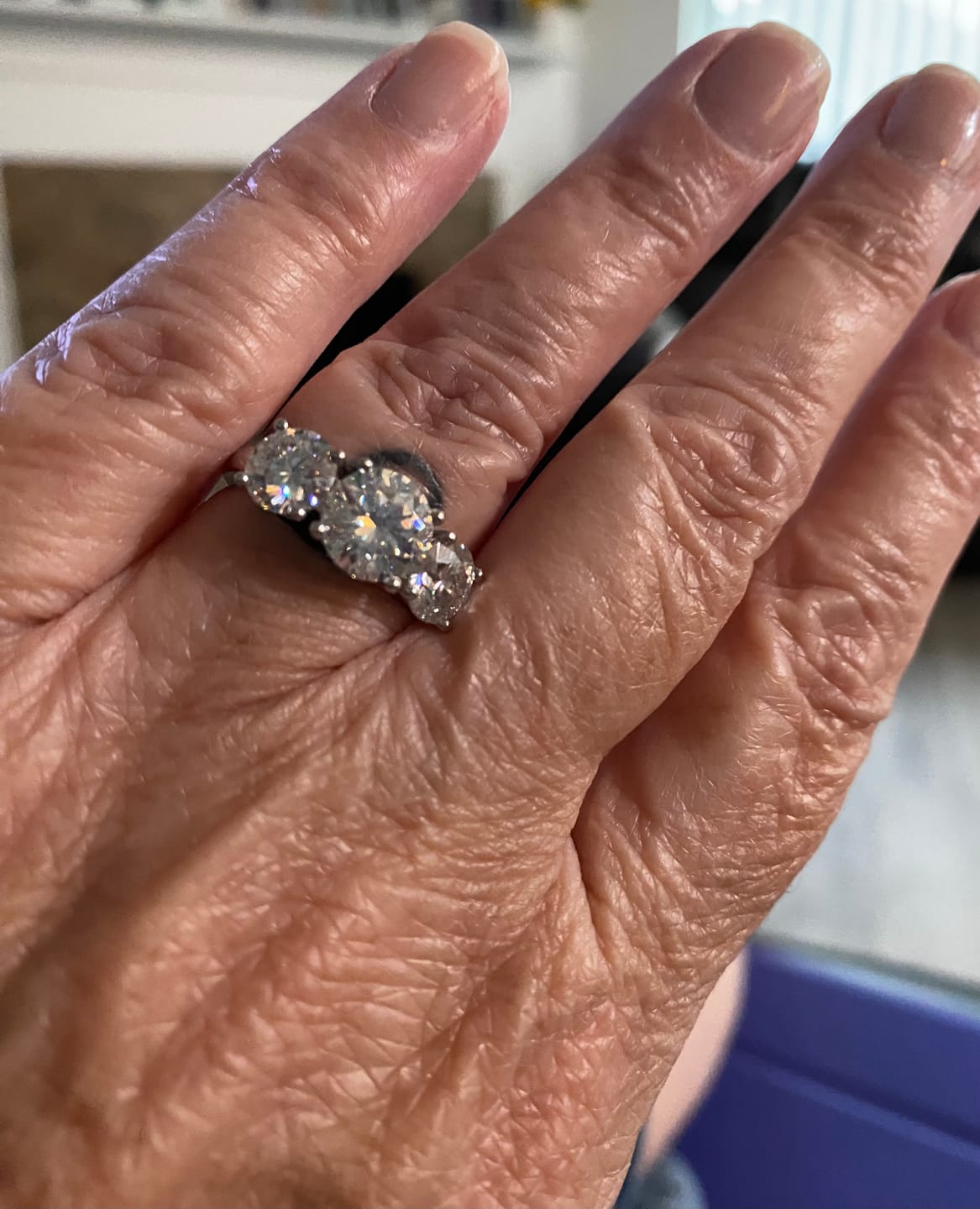 Customer photo review of Classic Three Stone Round Cut Moissanite Engagement Ring