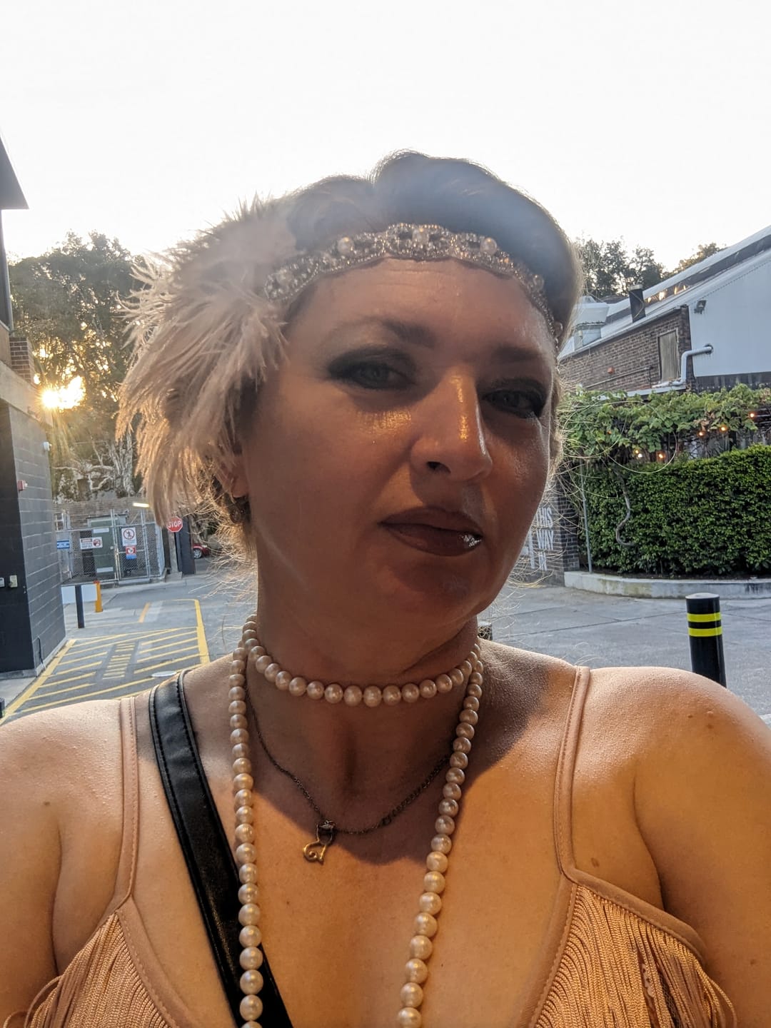 Customer photo review of Blush Deco & Pearl Feather Headband