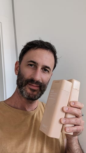 Customer photo review of Gloss Hair Growth Shampoo