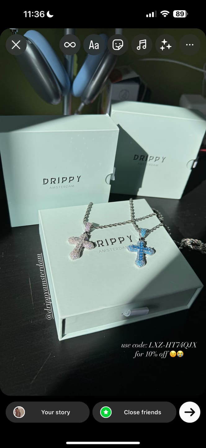 Customer photo review of BLUE CROSS PENDANT. - WHITE GOLD