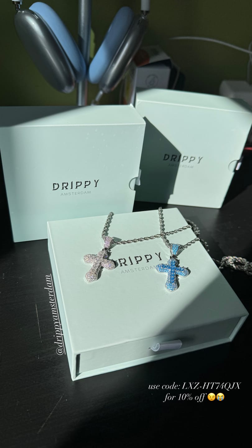 Customer photo review of FROSTY CROSS PENDANT. - WHITE GOLD