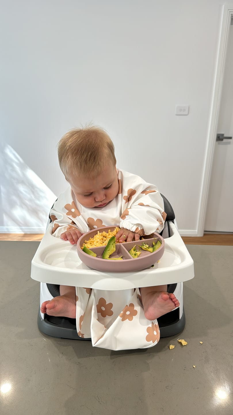Customer photo review of Mess-Free Smock Bib | Clay Daisy