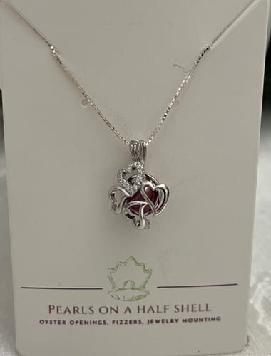 Customer photo review of Cage Pendant 925 Sterling Silver - Four Hearts Flowing