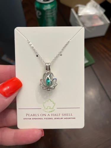 Customer photo review of Cage Pendant 925 Sterling Silver - Lotus Flower