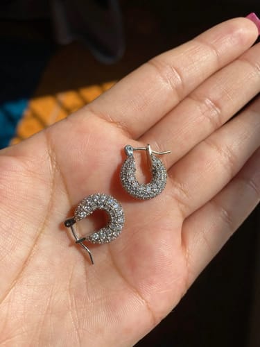Customer photo review of Mini Pavé Huggie Hoop Earrings - Iced Silver