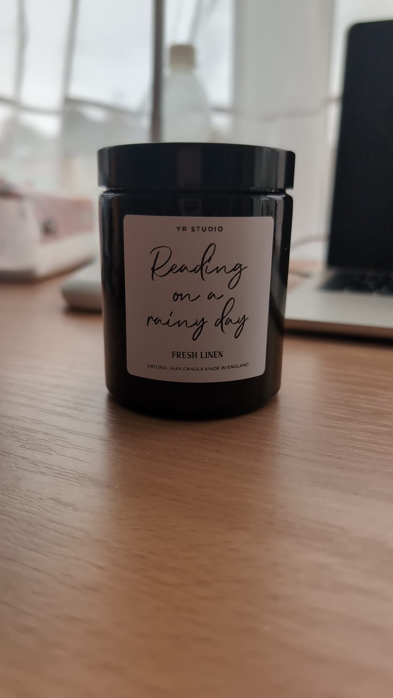 Customer photo review of “Reading On A Rainy Day” Book Candle