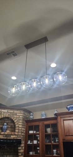 Customer photo review of Brass 5-Light Glass Globe Linear Pendant