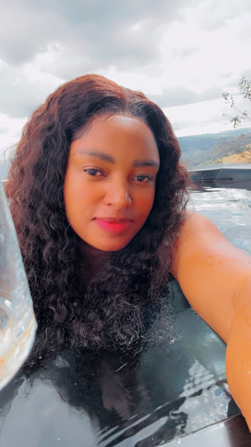 Customer photo review of Gorgeous 20-inch Malaysian Long Curly Wig with Lace Closure - Premium Human Hair