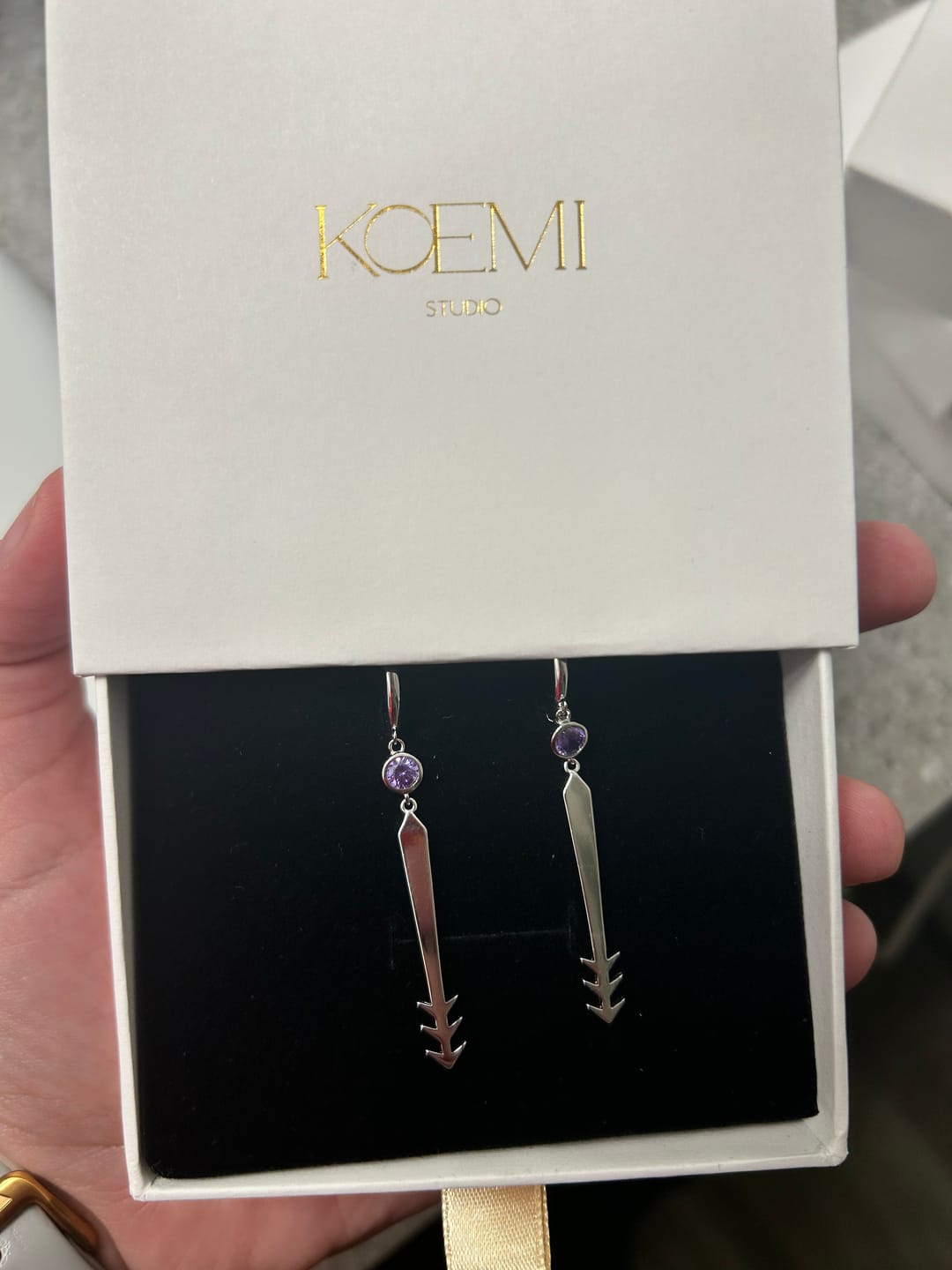 Customer photo review of Blood Manipulation Earrings