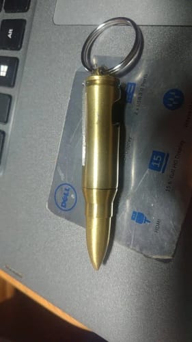 Customer photo review of PORTE CLÉ DÉCAPSULEUR GOLDEN BULLET