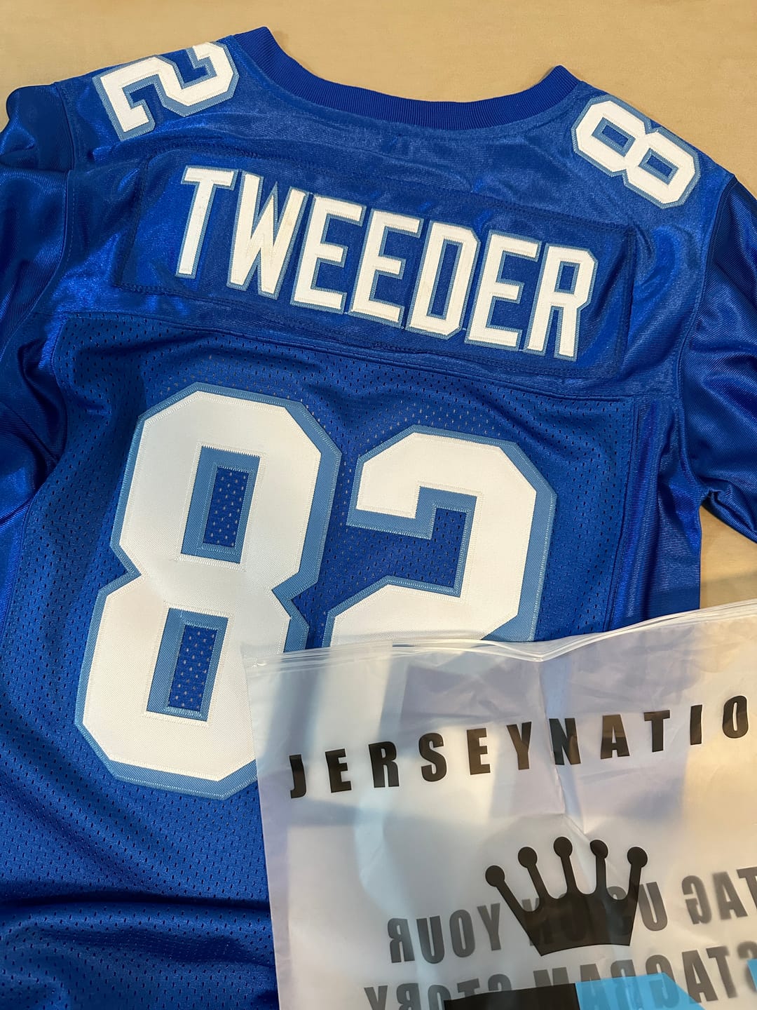 Customer photo review of Charlie Tweeder Varsity Blues West Canaan Coyotes Football Jersey