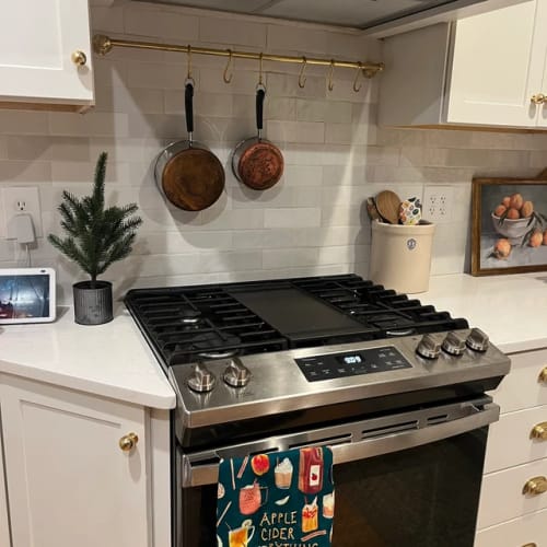 Customer photo review of Unlacquered Brass Wall Mounted Pot Rack , Brass Kitchen Rail with Hooks , Brass Wall Pot Rack Kitchen Storage