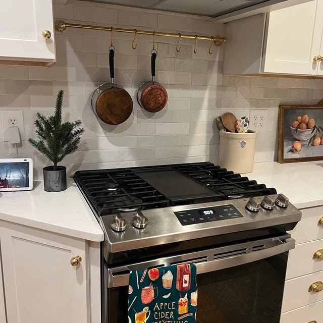 Customer photo review of Unlacquered Brass Wall Mounted Pot Rack , Brass Kitchen Rail with Hooks , Brass Wall Pot Rack Kitchen Storage
