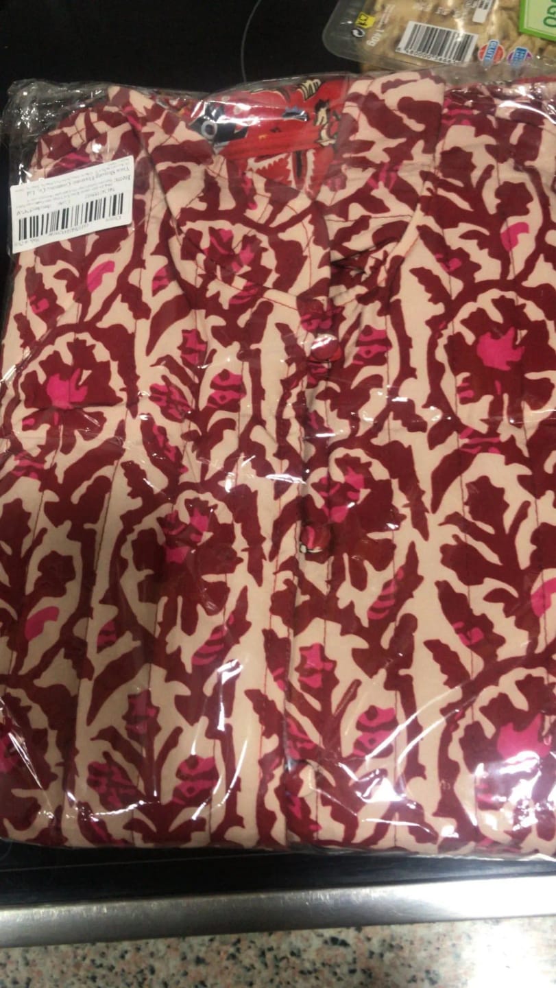 Customer photo review of Veste matelassée sans manches réversible rouge Cécile