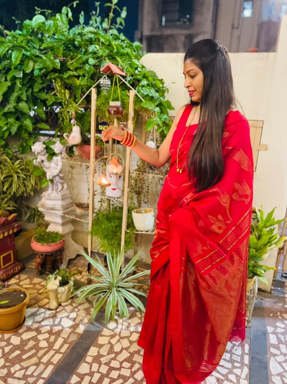 Customer photo review of Handwoven Red Cutwork Jamdani Saree