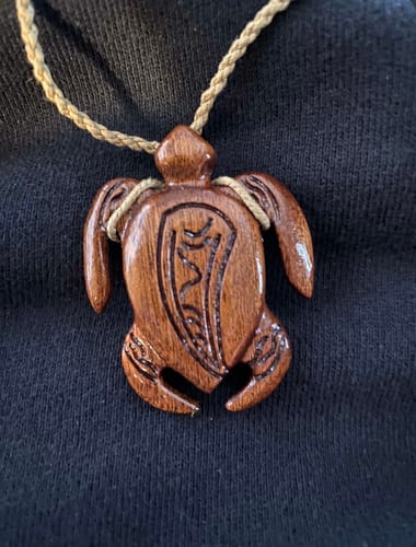 Customer photo review of Koa Wood Honu (Hawaiian Turtle) Necklace 40x49mm