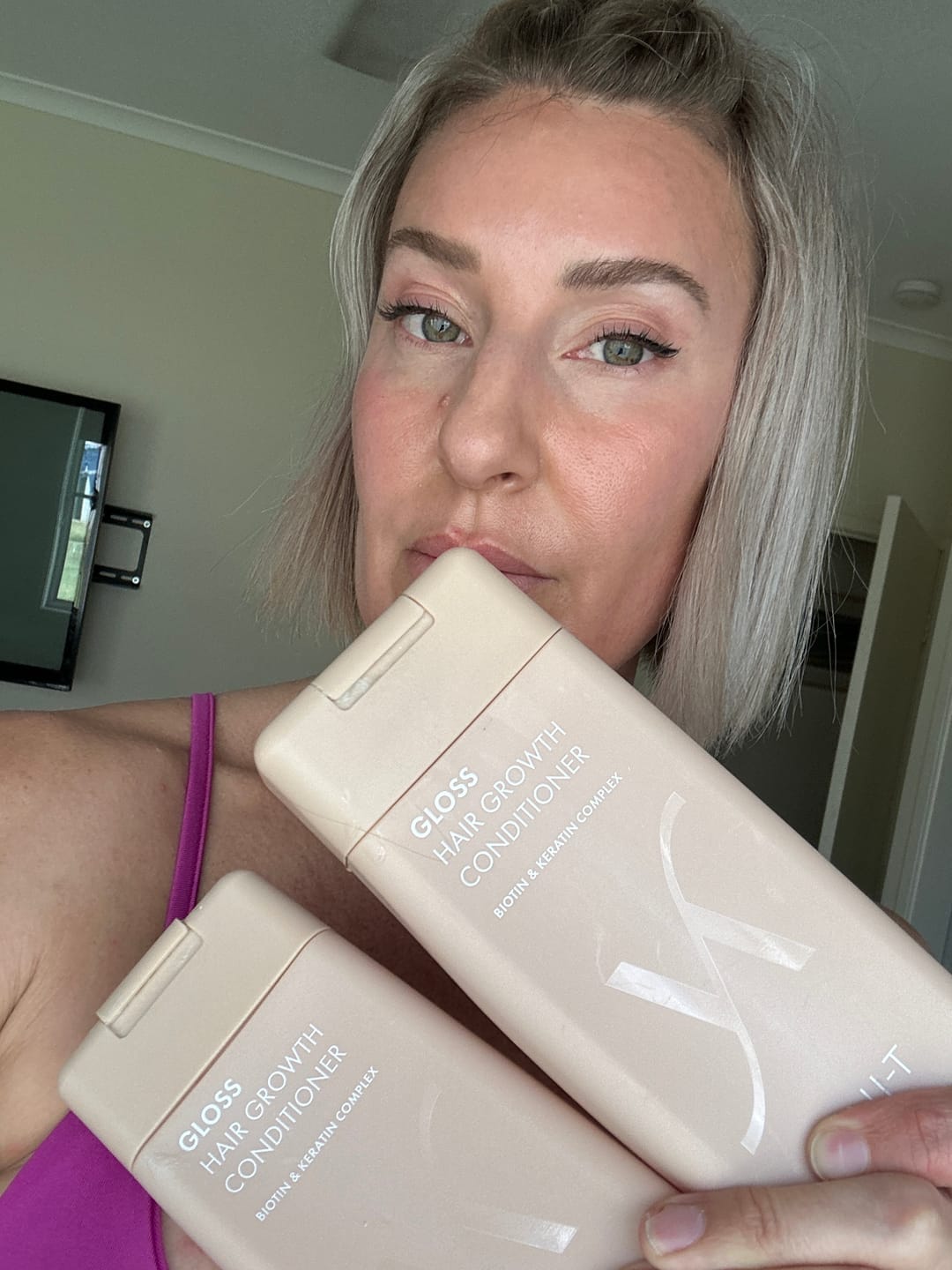 Customer photo review of Gloss Hair Growth Shampoo