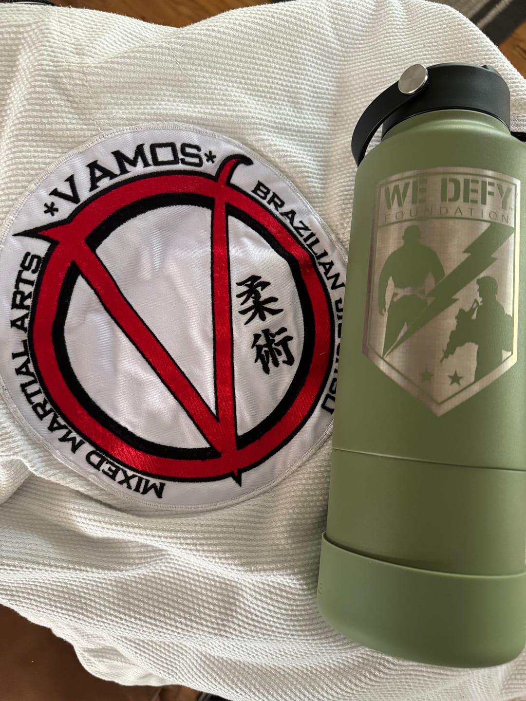Customer photo review of Flobottle Special Edition: Hydrate for a Cause with We Defy Support- Green