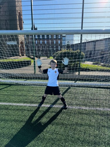 Customer photo review of Kids Mystery Football Shirt