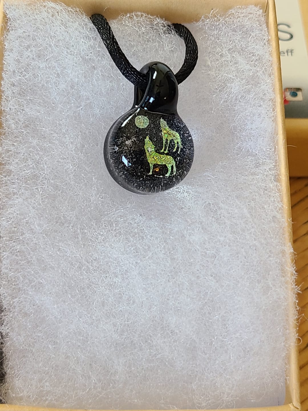 Customer photo review of Howling Wolf Hologram Pendant with Infused Cremation Ash