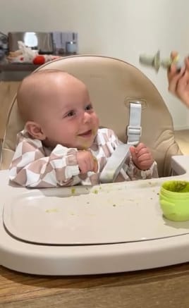 Customer photo review of Mess-Free Smock Bib | Taupe Checkered