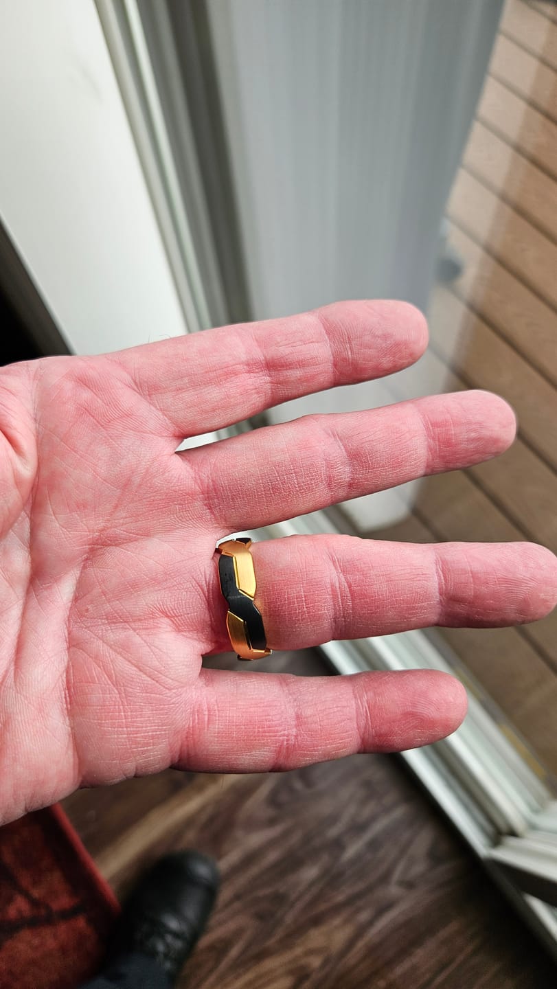 Customer photo review of Tungsten Black and Gold Infinity Knot Ring, Tungsten Rings for Men Wedding Band