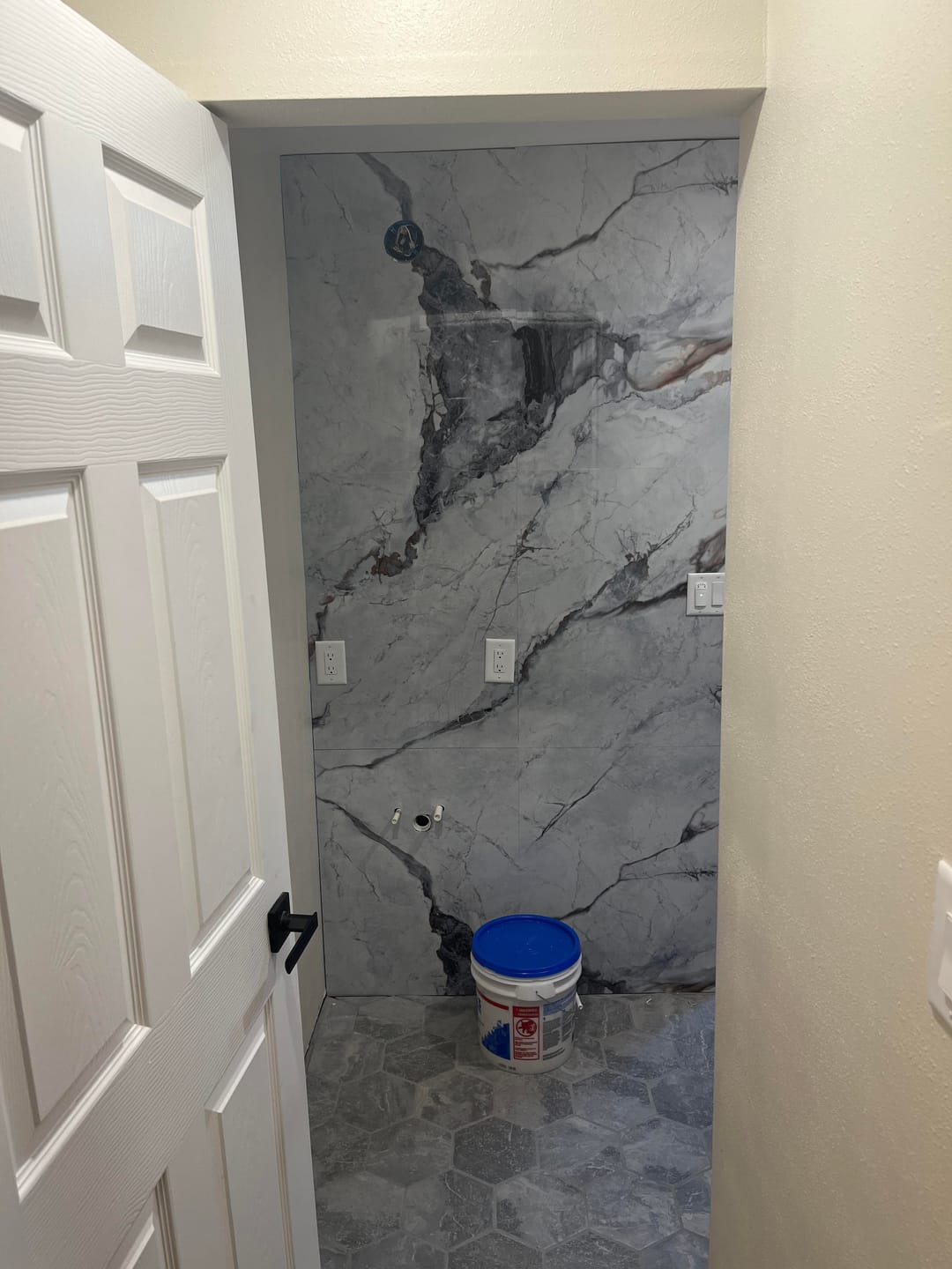 Customer photo review of Continental Carrara Marble Wall Panel 96" X 48"
