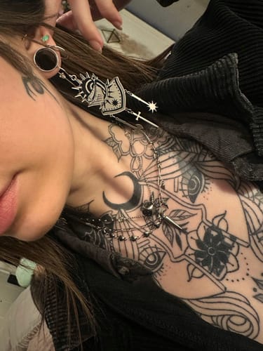 Customer photo review of Talis Dice Necklace