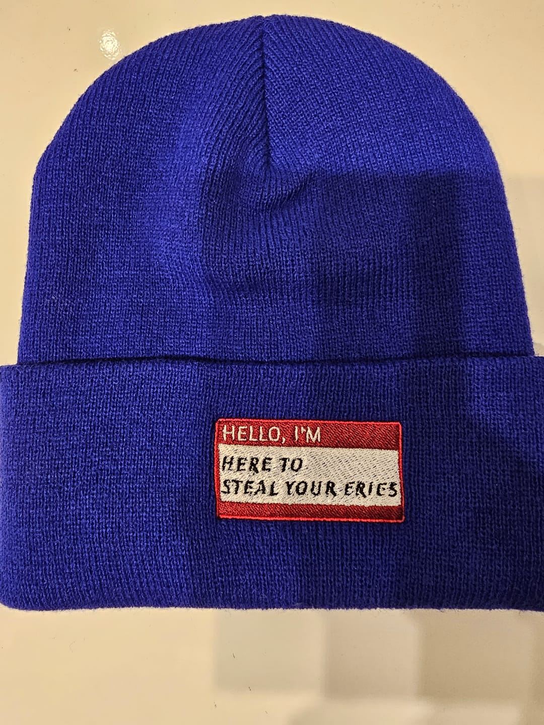 Customer photo review of HELLO I'M HERE TO STEAL YOUR FRIES Beanie