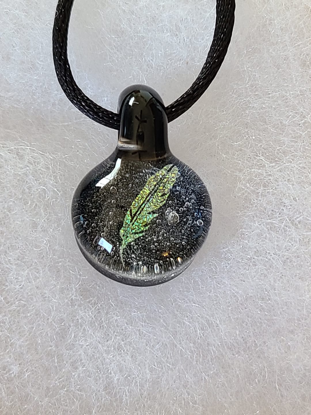 Customer photo review of Feather Hologram Pendant with Infused Cremation Ash