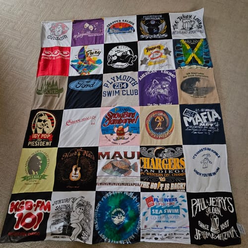 T-shirt quilt with swimming, music themes by Lynn from MI