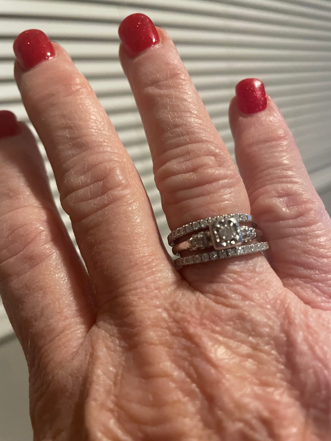 Customer photo review of Moissanite Round Half Eternity Sterling Silver Wedding Band Stackable Ring