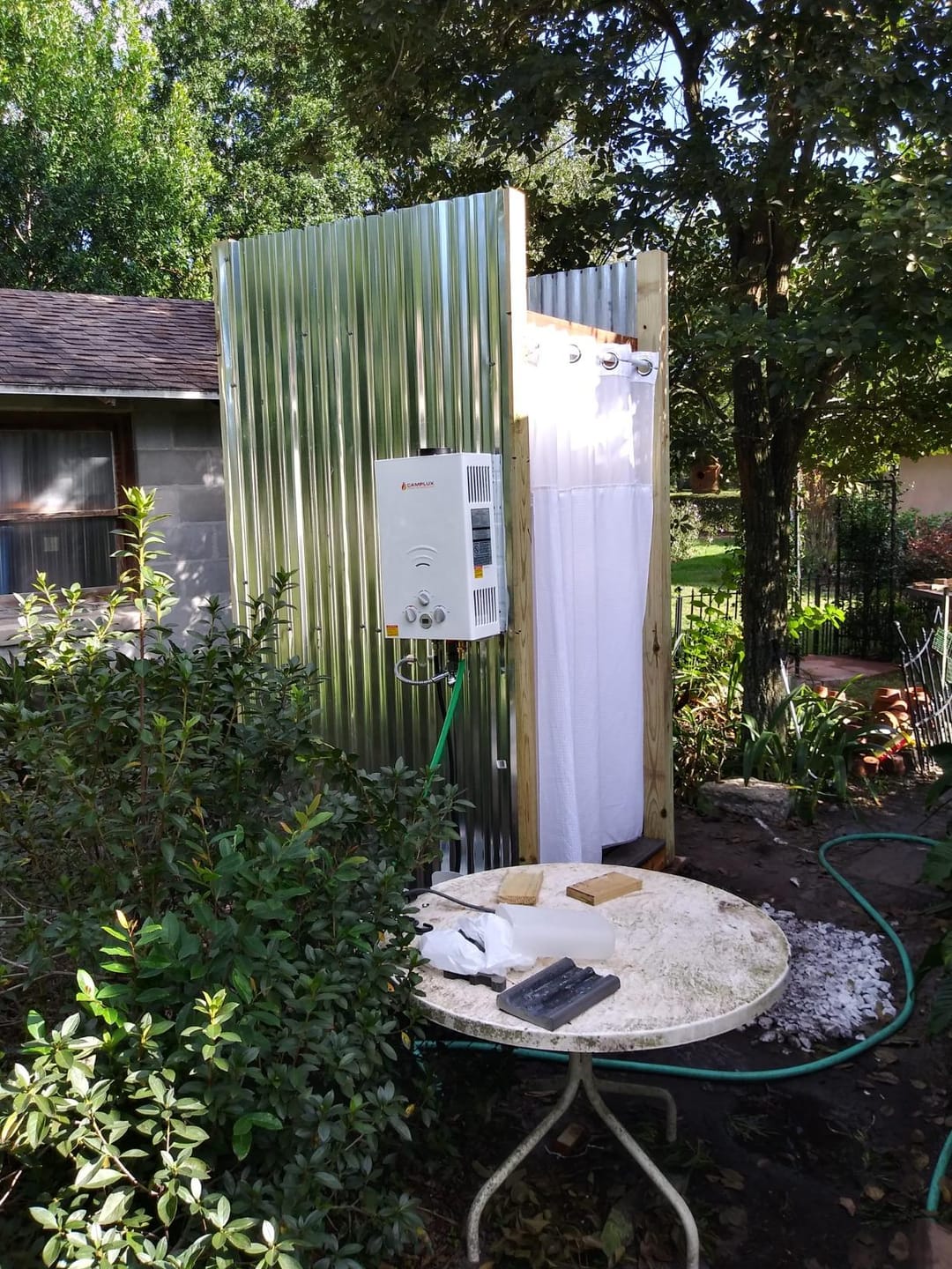 Customer photo review of Propane Portable Tankless Water Heater Outdoor, Camplux 2.64 GPM Instant Hot Camping Showers with 3.3 GPM Water Pump & Pipe Strainer